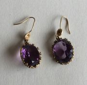 A pair of Antique gold stone set earrings with loo