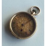 A lady's 14 carat fob watch with engraved decorati