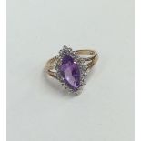 A 9 carat amethyst and diamond marquise shaped clu