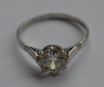 A good French diamond single stone ring in platinu