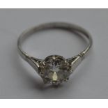 A good French diamond single stone ring in platinu