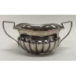 An Edwardian silver sugar bowl with wavy edge. Che