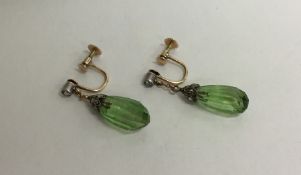 A pair of unusual Victorian faceted peridot and ro