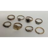 A bag containing eight 9 carat gems set rings. App