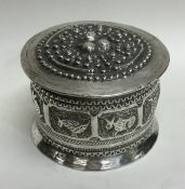 A Continental silver box and cover decorated with