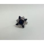 A massive sapphire and diamond cluster ring, the l