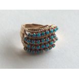 An 18 carat turquoise four row swirl ring with wea