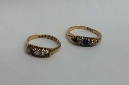 Two 18 carat diamond set rings. Approx. 6.7 grams.