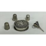 A bag containing silver thimbles, funnels etc. App