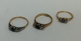 Three 18 carat diamond rings. Approx. 8.2 grams. E