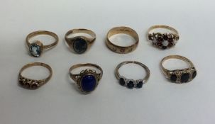 Eight 9 carat gem set rings. Approx. 21.2 grams. E