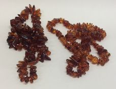 Two graduated strings of amber beads. Approx. 128