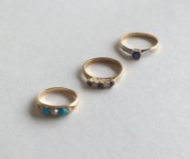 A group of three 18 carat gold stone set rings. Ap