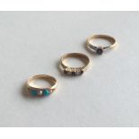 A group of three 18 carat gold stone set rings. Ap