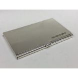 A good quality plain silver card case with hinged