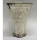A tall Swedish silver vase attractively decorated