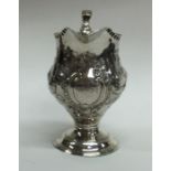 A good Georgian helmet shaped silver cream jug emb