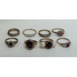 A group of eight 9 carat gem set rings. Approx. 18