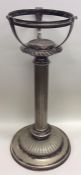 A large silver plated lamp base. Est. £30 - £40.