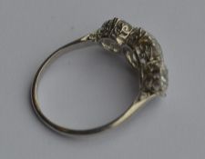 A good diamond three stone ring in platinum setti