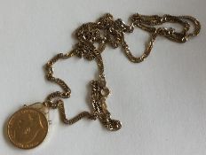A 1906 sovereign mounted as a pendant on fine link