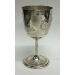 A Victorian silver engraved goblet decorated with