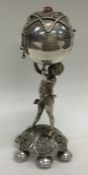 An unusual Jewish silver spice box mounted with a