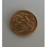 A 1906 full sovereign. Est. £200 - £300.