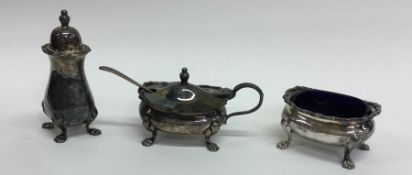 An Edwardian silver three piece cruet. Birmingham.