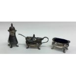 An Edwardian silver three piece cruet. Birmingham.