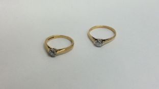 Two diamond single stone rings in 18 carat gold. A