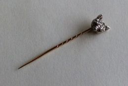 A novelty gold stick pin in the form of a fox's he