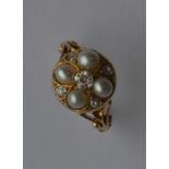 A good Victorian pearl cluster ring with scroll de