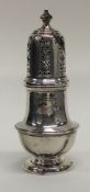 A small Georgian style silver baluster shaped suga