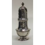 A small Georgian style silver baluster shaped suga