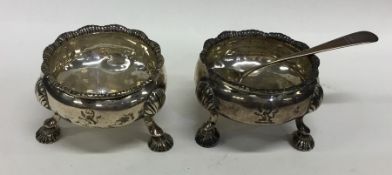 A pair of Georgian silver salts together with a sp