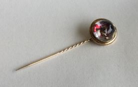 ESSEX CRYSTAL: An unusual stick pin mounted with a