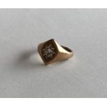 A large heavy gent's 9 carat signet ring, the cent
