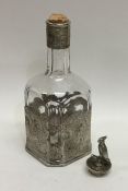 A Continental silver mounted decanter attractively