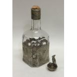 A Continental silver mounted decanter attractively