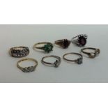 Eight 9 carat gem set rings. Approx. 18.1 grams. E