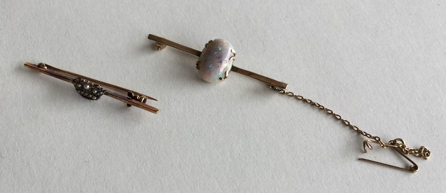 An opal and 9 carat bar brooch together with one o