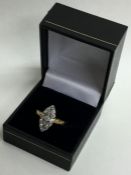 A Victorian diamond marquise shaped ring in 18 car