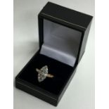 A Victorian diamond marquise shaped ring in 18 car