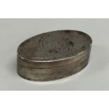 An 18th Century engraved oval silver snuff box. Pu