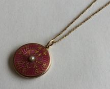 An attractive Continental enamel pendant with gild