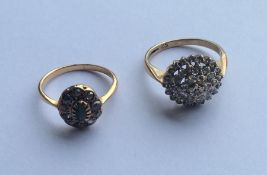 Two 9 carat diamond set cluster rings. Approx. 5.4