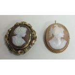 A pinch-back swivel cameo together with a gold fra