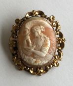 An attractive oval cameo of a lady in gold frame.