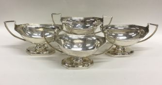 A set of four Georgian Adams' style silver salts.